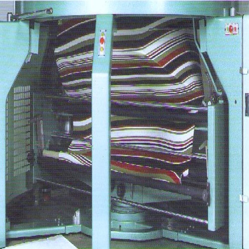 THE JUMBO OPEN WIDTH KNITTING MACHINE